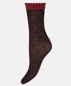 Black sheer knee-high sock with a red scalloped cuff and diamond lattice pattern.