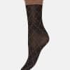 Black sheer sock with a tan scalloped cuff and tan diamond lattice pattern in a knee-high style.