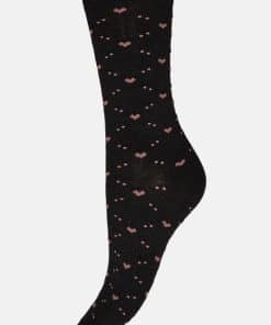 Black knit sock with scattered small pink hearts on a dark background (women's ankle sock).