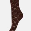Maroon knit sock with a beige diamond argyle pattern.