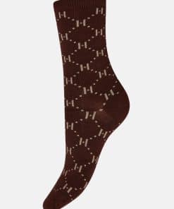 Maroon knit sock with a beige diamond argyle pattern.