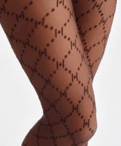 Close-up of legs wearing sheer brown tights with a repeating diamond lattice pattern.