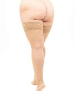 Back view of a person wearing a beige thong and lace thigh-high stockings against a white background.