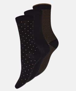 Set of three black socks with different patterns: dotted, plain, and striped gold accents.