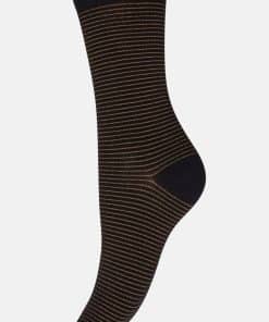 Black knee-high sock with thin tan stripes and reinforced toe and heel, displayed vertically for product viewing.