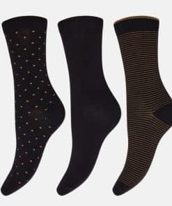 Three black socks shown side by side: left sock with small gold dots, middle solid black, right sock with thin gold stripes around the leg and foot.