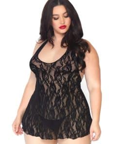 Plus-size woman in black lace sheer chemise with a floral pattern, looking down. (Model wearing lingerie)